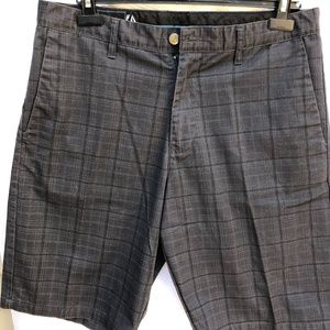 Black plaid Volcom Mens shorts ********  Size 34.